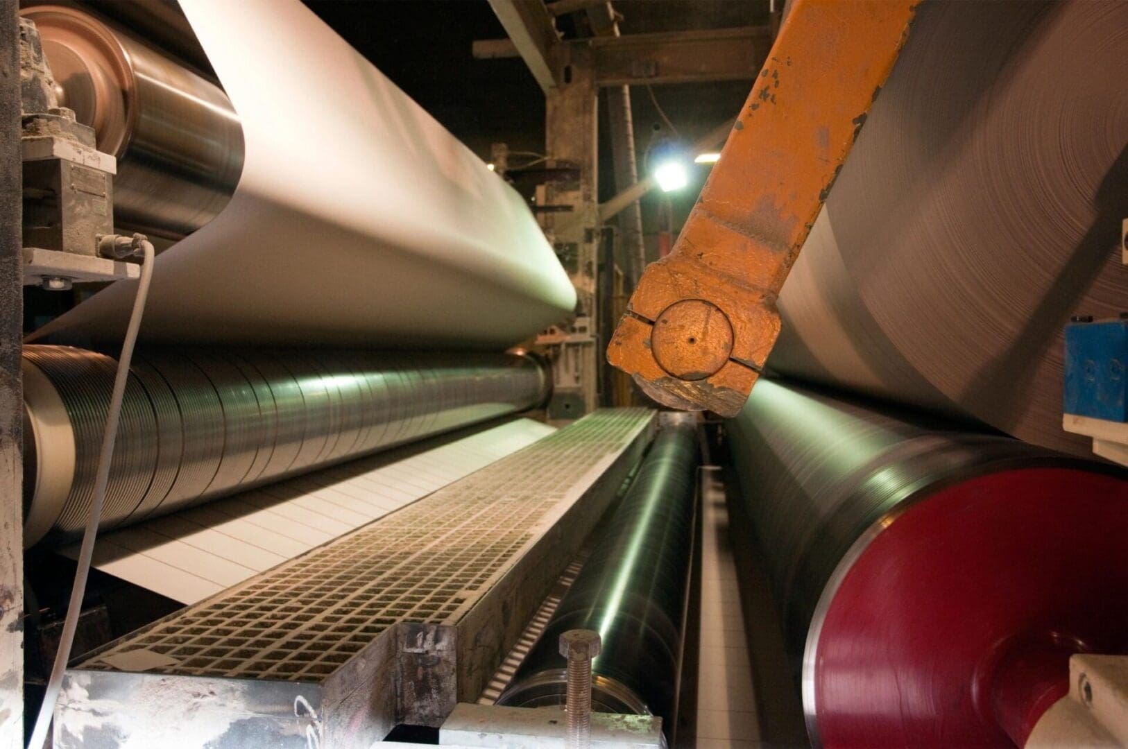 A machine that is in the process of making paper.