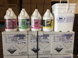 Cleaning products sitting on boxes